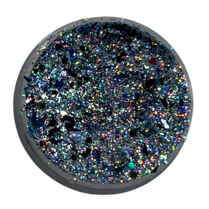 A single discountable face sprinkle with blue shifting blend, iridescent and holographic elements, and black lighting bolts.